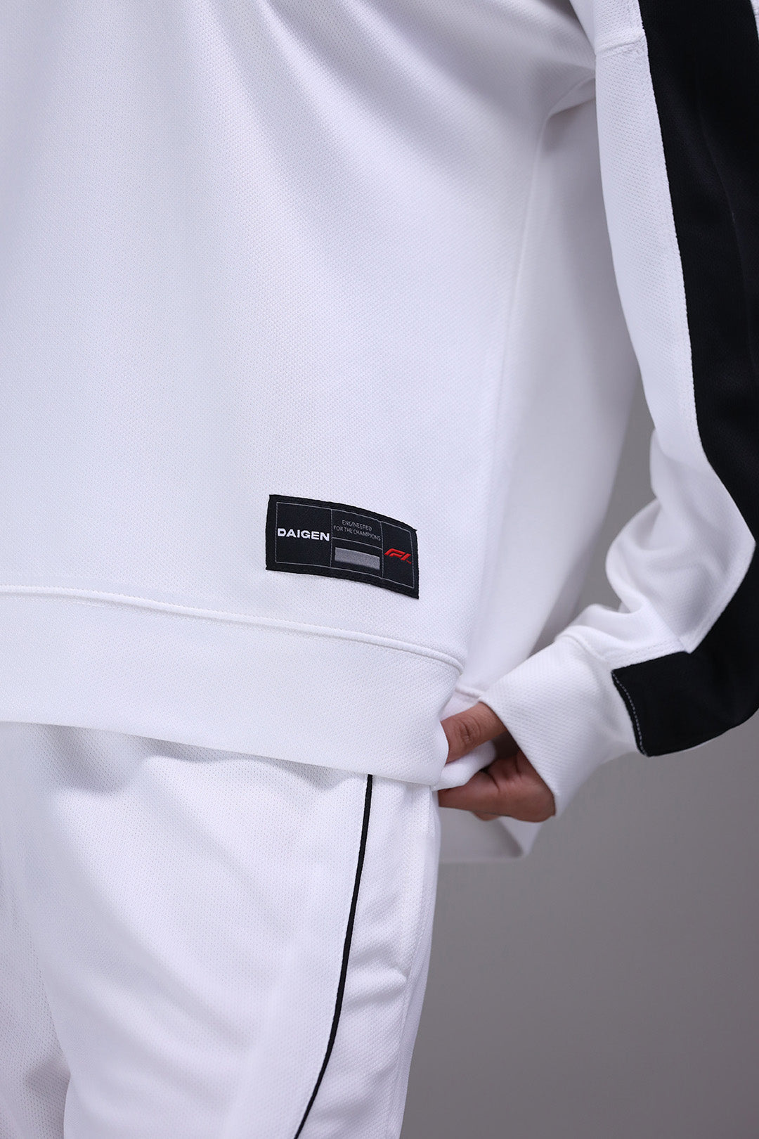 F1 jersey fabric and logo detail close up